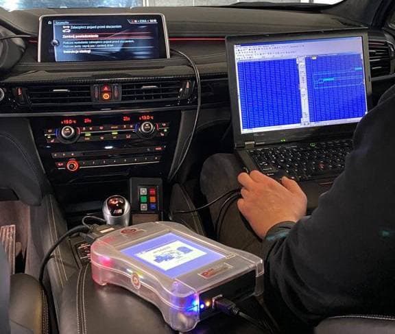 BMW engine illustration representing professional chiptuning services.